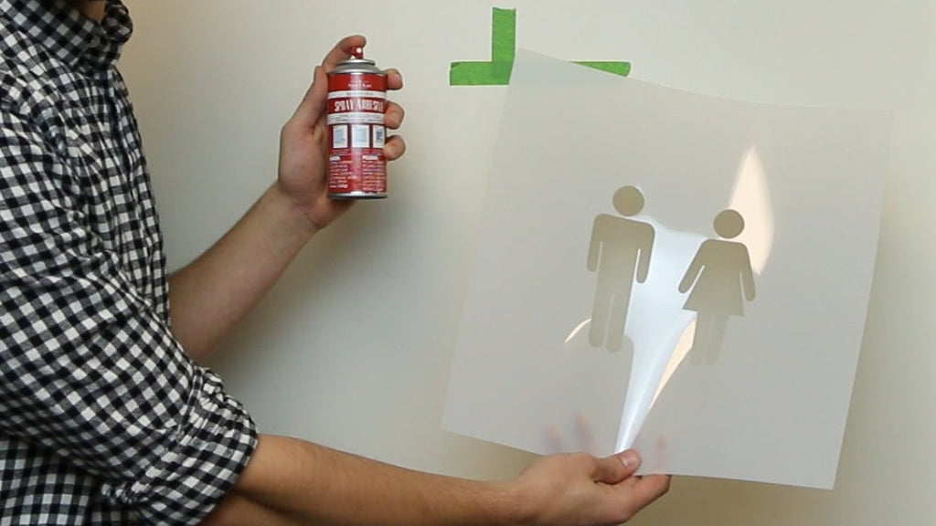 Marking Restroom Doors with Women & Men Stencil