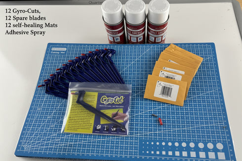 12 Gyro Cuts, 12 Self healing mats, 12 spare blades and 3 cans of repositionable spray