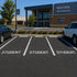 Student Parking Lot Stencil applied to parking spaces in a High School Parking Lot.
