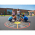 Children playing with a circular game on a school playground