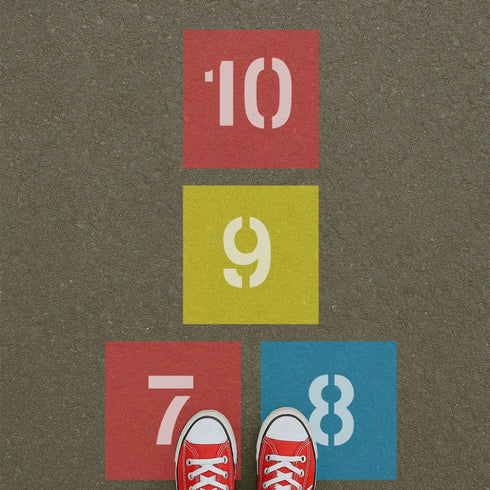 Colorful hopscotch grid with numbers on a brown background