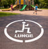 Lunge symbol on a playground surface with children playing in the background