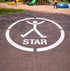 White 'STAR' logo on a playground surface with children playing in the background.