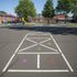 Playground with hopscotch grid and colorful playground equipment.
