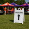 Parking Stencil with an arrow that has been stenciled onto an a-frame sign for tailgate parking