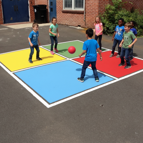 Children playing with a ball on a colorful playground surface.