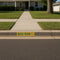 Baylor Bears Logo painted onto a curb using the Sic 'Em Curb Painting Stencil.