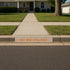 curb painted with the Go Big Orange Curb Painting Stencil