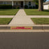 CyclONEnation Iowa State Stencil painted onto a residential curb.