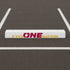 White curb stop with 'CYCLONE NATION' text stenciled onto it.