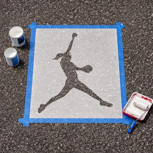 Softball Player stencil taped down to a high school seniors' parking spot