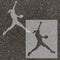 Softball pitcher silhouette stenciled on pavement with matching stencil.