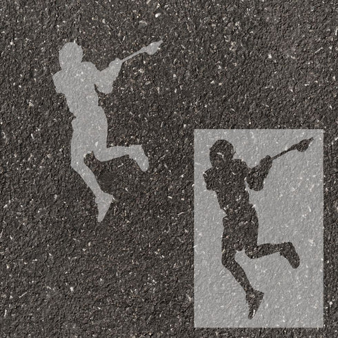 Men's lacrosse player silhouette stenciled on pavement with matching stencil.