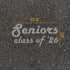 Text 'Seniors Class of '26' with measurements on pavement.