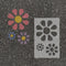 Flowers stenciled on pavement with matching parking space stencil.