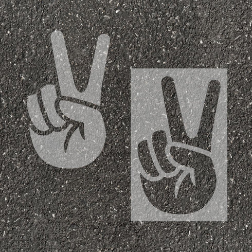 Peace stenciled on pavement with matching parking space stencil.