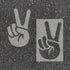 Peace stenciled on pavement with matching parking space stencil.