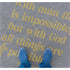 Person standing on pavement that has been stenciled with the Matthew Bible Verse text.