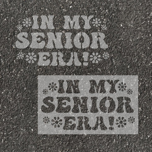 'In My Senior Era!" stenciled on pavement with matching parking space stencil.