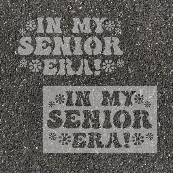 'In My Senior Era!" stenciled on pavement with matching parking space stencil.