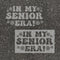 'In My Senior Era!" stenciled on pavement with matching parking space stencil.