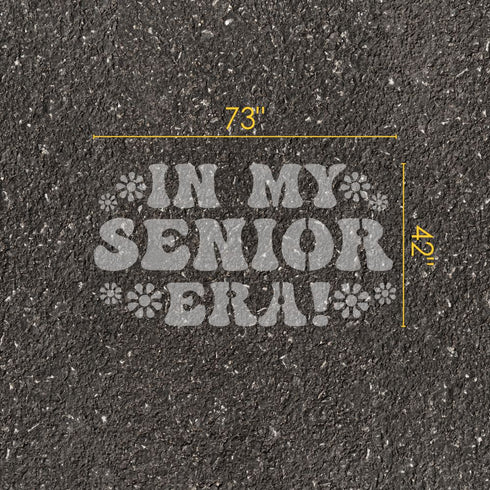 In My Senior Era parking space stencil with measurements on pavement.