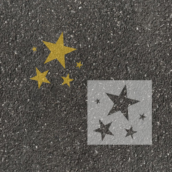 Stars stenciled on pavement with matching parking space stencil.