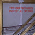 Two Hour Fire Barrier Protect All Openings Stencil Applied to a Wall