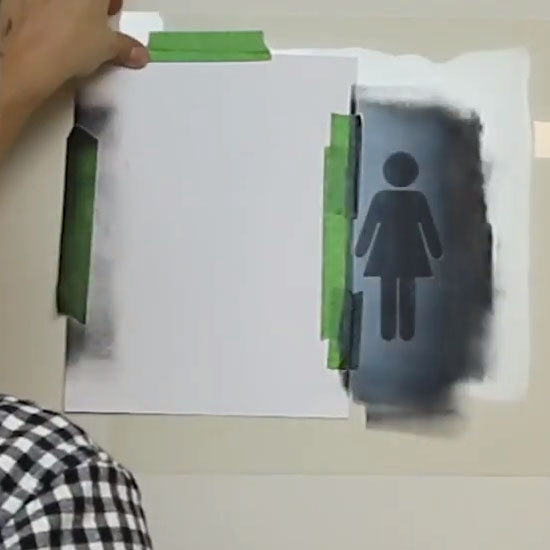 Marking Restroom Doors with Women & Men Stencil